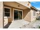 A covered patio with an additional window at 2331 E Pecan Rd, Phoenix, AZ 85040