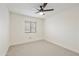 Bedroom featuring neutral paint, carpet and a modern ceiling fan with light fixture at 2440 E Hale St, Mesa, AZ 85213