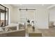 Cozy living room showcasing a barn door to the office, hardwood floors, and stylish, comfortable seating at 2440 E Hale St, Mesa, AZ 85213