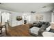 This living room features a fireplace, built-in cabinets, and a sectional sofa at 2484 E Lodgepole Dr, Gilbert, AZ 85298