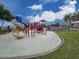 View of a modern playground area with slides, climbing structures, and soft surface flooring at 2525 W Sat Nam Way, Phoenix, AZ 85086