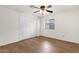 Bedroom with closet and wood-look flooring at 2570 W Scenic St, Apache Junction, AZ 85120