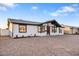 Charming single-story home with desert landscaping, fresh paint, and a covered front patio at 2834 N 65Th Ave, Phoenix, AZ 85035