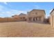 Spacious backyard featuring rock landscaping, block wall fencing and covered patio at 28793 N Spur Dr, San Tan Valley, AZ 85143