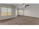 Spacious bedroom with carpet flooring, a ceiling fan, and great natural light at 28793 N Spur Dr, San Tan Valley, AZ 85143