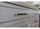 Detailed view of gray kitchen cabinets, drawers, and hardware, highlighting the elegant design and quality craftsmanship at 2964 E Palo Verde St, Gilbert, AZ 85296