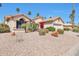 Lovely home boasting well-maintained desert landscaping and a neutral color palette at 3032 N 160Th Ave, Goodyear, AZ 85395