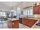 Kitchen with granite countertops, stainless steel appliances, and a center island at 3032 N 160Th Ave, Goodyear, AZ 85395