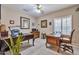 Spacious home office featuring dual desks, ceiling fan, and natural light at 3032 N 160Th Ave, Goodyear, AZ 85395