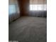 Bedroom with carpet and panelling plus bright natural light at 3104 E Broadway Rd # 268, Mesa, AZ 85204