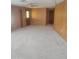 Room with carpet and panelled walls at 3104 E Broadway Rd # 268, Mesa, AZ 85204