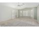 Bedroom with plantation shutters allowing natural light, and neutral carpet at 3191 N 160Th Ave, Goodyear, AZ 85395