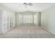 Bright bedroom with plantation shutters letting in light, and neutral carpet at 3191 N 160Th Ave, Goodyear, AZ 85395