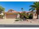 Charming single-story home featuring desert landscaping, a barrel tile roof, and a two-car garage at 3191 N 160Th Ave, Goodyear, AZ 85395