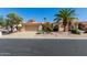 Charming single-story home featuring desert landscaping, a barrel tile roof, and a two-car garage at 3191 N 160Th Ave, Goodyear, AZ 85395