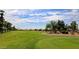 Expansive view of the meticulously maintained golf course at the PebbleCreek Resort Community at 3191 N 160Th Ave, Goodyear, AZ 85395