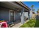 Covered back patio with a ceiling fan, table, chairs, and view of the lawn at 337 S Leandro --, Mesa, AZ 85208