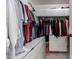 Organized walk-in closet featuring custom storage solutions and ample hanging space for clothes and accessories at 337 S Leandro --, Mesa, AZ 85208