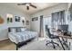 Well-lit bedroom with ceiling fan, work station, and natural light offers a comfortable and productive atmosphere at 3434 E Avalon Dr, Phoenix, AZ 85018