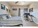 Relaxing bedroom featuring neutral colors, a ceiling fan, and a dedicated workspace for studying or remote work at 3434 E Avalon Dr, Phoenix, AZ 85018