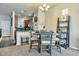 Dining area next to the kitchen with seating for four and access to outdoor light at 3434 E Avalon Dr, Phoenix, AZ 85018