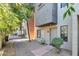 Inviting townhouse entrance with mature trees and manicured landscaping at 3434 E Avalon Dr, Phoenix, AZ 85018