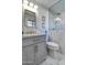 This bathroom features a marble walk-in shower, modern vanity, and contemporary fixtures for a spa-like experience at 4026 N 81St St, Scottsdale, AZ 85251