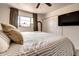 Bedroom with large window and a sliding-door closet at 4026 N 81St St, Scottsdale, AZ 85251