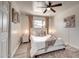 Cozy bedroom featuring a ceiling fan, neutral walls, and carpeted flooring for a comfortable living space at 4026 N 81St St, Scottsdale, AZ 85251