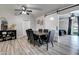 Open-concept dining area featuring hardwood floors with a view to the bedroom at 4026 N 81St St, Scottsdale, AZ 85251