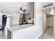 Well-lit kitchen boasts modern cabinets, stainless steel appliances, and a beautiful white countertop at 4026 N 81St St, Scottsdale, AZ 85251