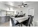 Bright living room with vaulted ceilings, neutral walls, and an open layout connected to the dining area at 4026 N 81St St, Scottsdale, AZ 85251