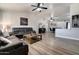 Spacious living room with vaulted ceiling, ceiling fans, and recessed lighting at 4026 N 81St St, Scottsdale, AZ 85251