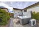 Relaxing backyard featuring a luxurious hot tub and a private outdoor space at 40440 W Haley Dr, Maricopa, AZ 85138