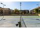 View of community tennis courts, framed by the net, offering a recreational space with convenient residential access at 461 W Holmes Ave # 277, Mesa, AZ 85210