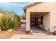 Inviting outdoor space featuring a covered patio, pool view, and lush landscaping at 4760 E Amber Sun Dr, Cave Creek, AZ 85331