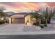 Charming single-story home showcasing desert landscaping and a spacious two-car garage at 4760 E Amber Sun Dr, Cave Creek, AZ 85331