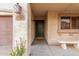 Inviting front entrance featuring a bench, stylish lighting, and an appealing green front door at 4760 E Amber Sun Dr, Cave Creek, AZ 85331