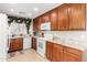 Well-lit kitchen featuring granite countertops and white appliances, plus ample cabinetry at 4760 E Amber Sun Dr, Cave Creek, AZ 85331