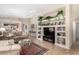 Cozy living room featuring a ceiling fan, open layout, and access to other areas of the home at 4760 E Amber Sun Dr, Cave Creek, AZ 85331