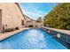 Inviting backyard pool with fountains, perfect for a refreshing swim and outdoor enjoyment at 4760 E Amber Sun Dr, Cave Creek, AZ 85331