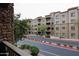 Apartment building exterior featuring many balconies and neatly manicured landscaping at 5350 E Deer Valley Dr # 2236, Phoenix, AZ 85054