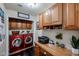 The well-organized laundry room is equipped with modern appliances, storage cabinets, and counter space at 5350 E Deer Valley Dr # 2236, Phoenix, AZ 85054