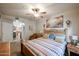 Serene main bedroom featuring natural light and a seamless transition to the ensuite bathroom at 5350 E Deer Valley Dr # 2236, Phoenix, AZ 85054