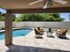 Inviting backyard with a pool, patio, and comfortable seating, perfect for outdoor entertaining at 5381 W Del Rio St, Chandler, AZ 85226