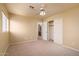 Carpeted bedroom with closet and exterior views at 5381 W Del Rio St, Chandler, AZ 85226