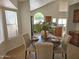 Kitchen nook area features a round table that seats four, next to the kitchen at 5381 W Del Rio St, Chandler, AZ 85226