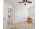 Bright bedroom with a large closet, neutral carpet, and natural light from the window at 5824 E Hoover Ave, Mesa, AZ 85206