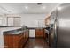 Functional kitchen featuring stainless steel appliances, plenty of counter space, and an open layout at 5824 E Hoover Ave, Mesa, AZ 85206