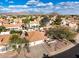 Beautiful aerial view of a suburban home featuring a tile roof, desert landscaping, and mountain views at 6118 E Star Valley St, Mesa, AZ 85215